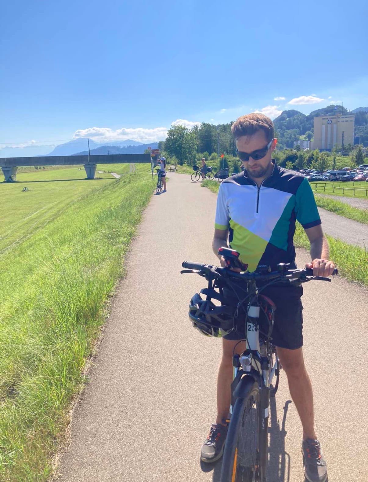 Roman Moroz with a bicycle during a ride.